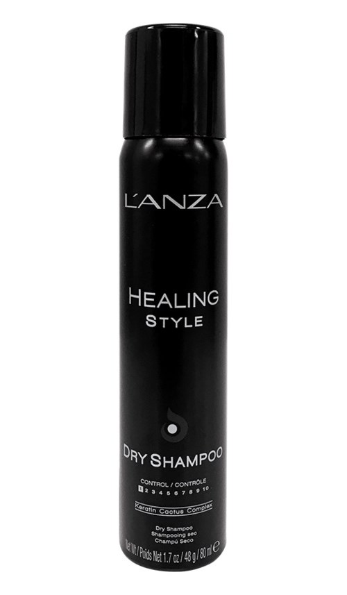 En svart burk av L'ANZA Healing Style Torrschampo med svart lock och vit text.