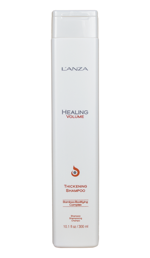 En vit flaska med lock, märkt L'ANZA, Healing Volume Thickening Shampoo, 10,1 fl oz. En hårvårdsprodukt.