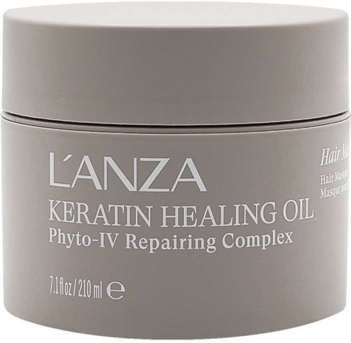 En grå behållare av L'ANZA Keratin Healing Oil med Phyto-IV Repairing Complex för hårryggning.