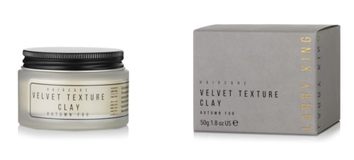 En burk och en box för Velvet Texture Clay, en kosmetisk produkt, i enkla svarta, grå och vita färger.