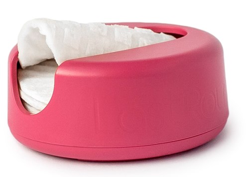 En rosa eske med papirlommetørklær inni. Enkel design, rund form, og myk farge.