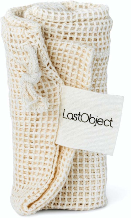 Ein cremefarbener Waffelstrickstrumpf mit einem weißen Etikett, auf dem 'LastObject' steht.