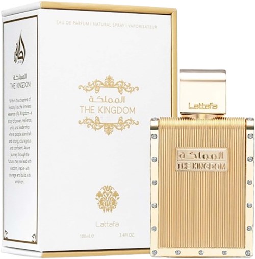 Butelka perfum i pudełko oznaczone 'The Kingdom' z złotymi detalami i srebrnymi kropeczkami. Prosty i elegancki design.