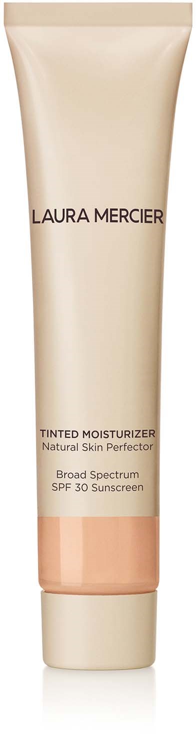A beige tube of Laura Mercier tinted moisturizer with SPF 30, labeled as a natural skin perfector.