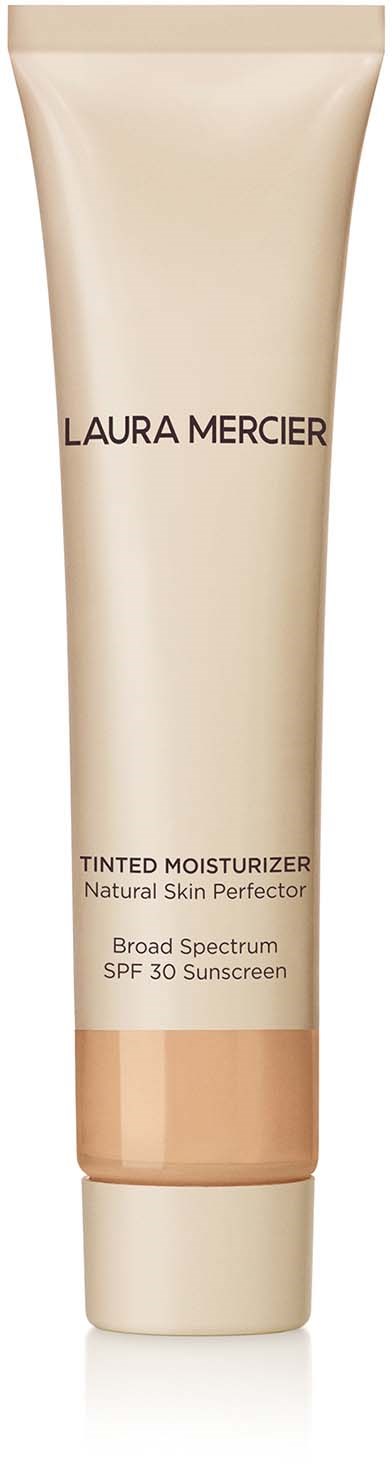 Ett beige rör av Laura Mercier tonad dagkräm med SPF 30, märkt som naturligt skönhet och bredspektrums skydd.