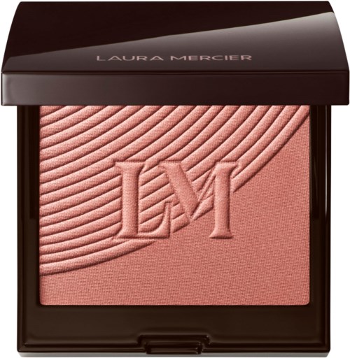En makeup-kompakt med präglat logo och texturerad design, märkt Laura Mercier.