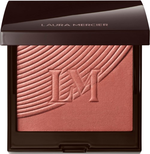 En rosa Laura Mercier rouge med texturerad design och upphöjda bokstäver LM i mitten.
