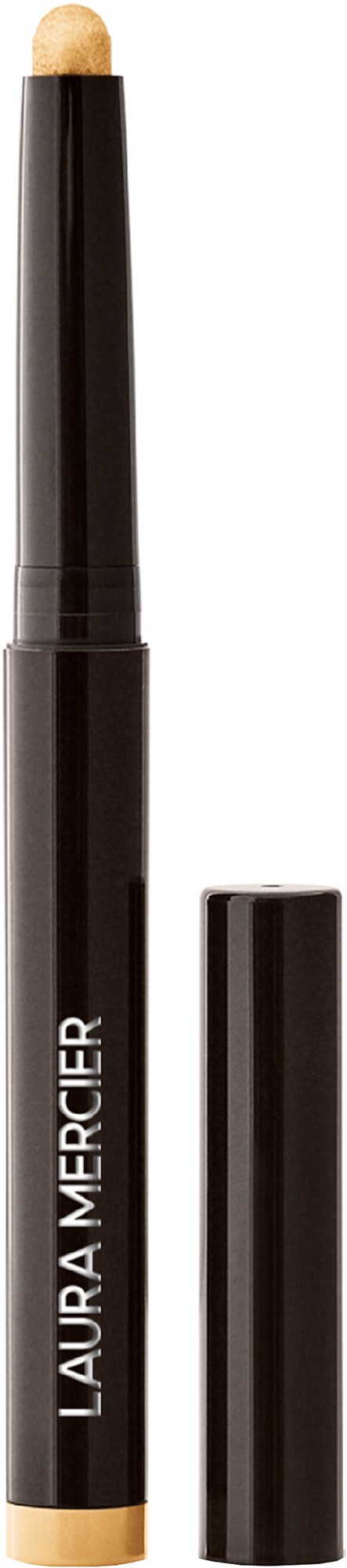 A black Laura Mercier makeup stick with the cap removed, showing a beige cream inside.