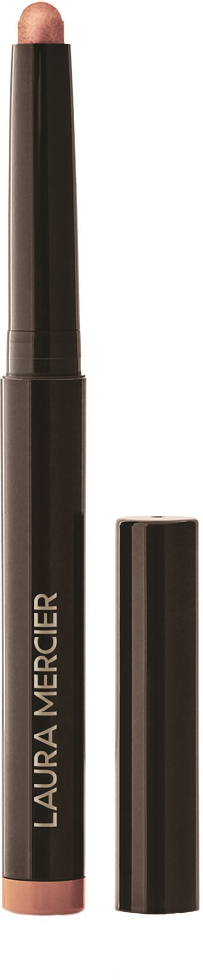 A Laura Mercier makeup stick with the cap removed, showing a beige tip for application.