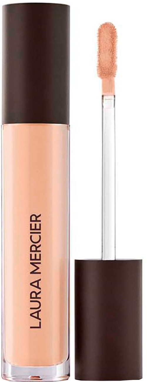 En läppglansflaska med brun topp och klar botten, märket 'Laura Mercier' står på.