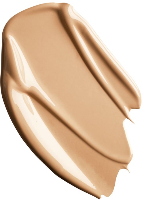 En strykning av beige flytande smink eller foundation på en vit bakgrund.