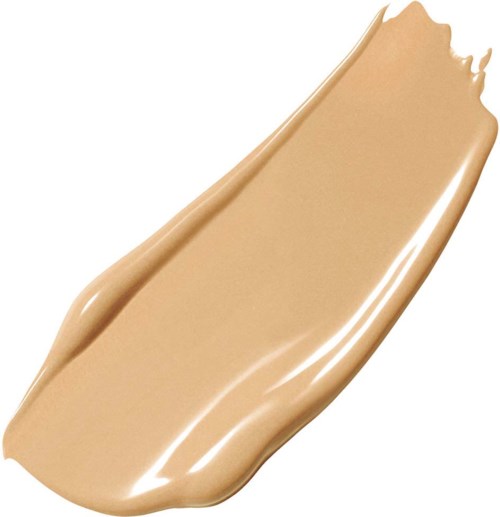A smear of beige-colored liquid makeup or foundation with a smooth texture and shiny appearance.