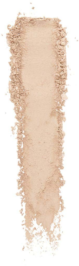 Beige Pulver in einer vertikalen Linie mit unregelmäßigen Rändern.