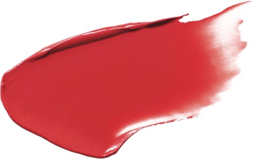 A red lipstick smear with a smooth, shiny surface and a tapered end. No other objects or background details.