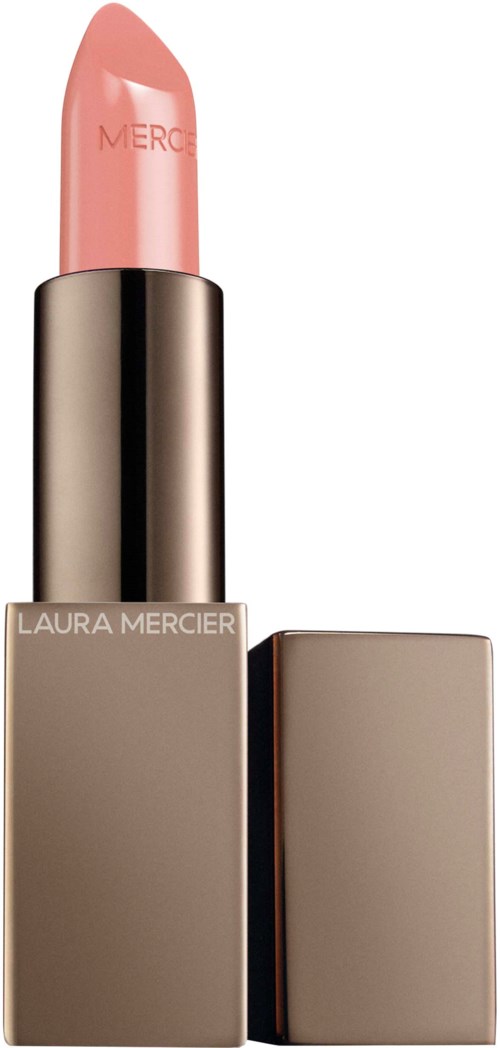 A lipstick in a beige case with a pale pink shade, partially opened to show the color.