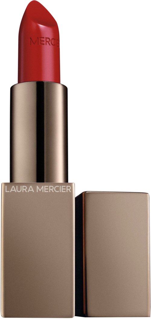 A red lipstick with a beige and gold case, displaying the Laura Mercier brand. The lipstick is partially open.