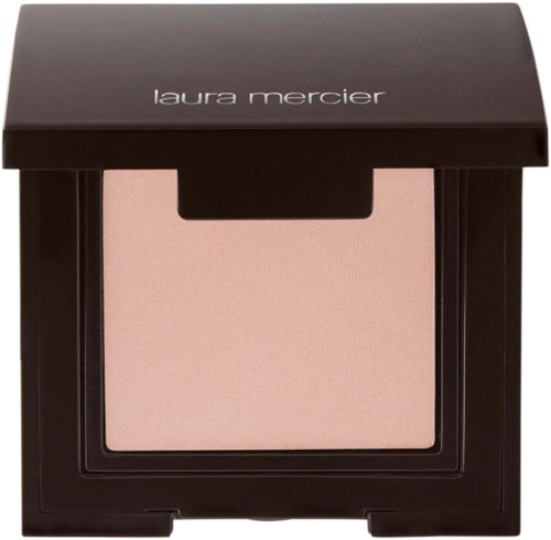 Laura Mercier-meikkipakkaus, jossa vaaleanpunainen puuteri ja musta kansi.