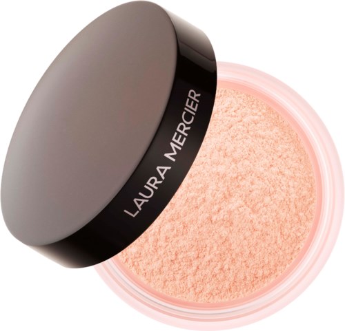 Ein Behälter mit losem pfirsichfarbenem Puder und grauem Deckel mit der Aufschrift Laura Mercier.