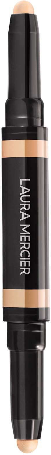 En dobbeltende makeup-stift med sort og beige farve, mærket 'LAURA MERCIER', brugt til øjenskygge eller concealer.