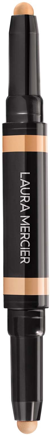 En dobbeltspids makeup-stift med brandnavnet Laura Mercier på, med beige og sort farveskema.