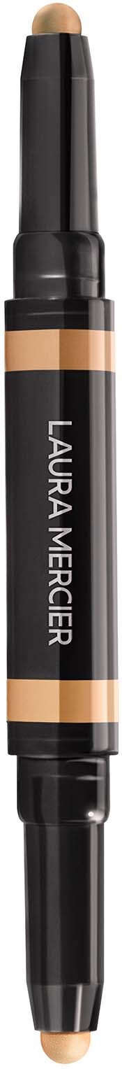 En dobbel-endet makeup-pen med sort skaft, beige nuancer og teksten 'Laura Mercier' på.