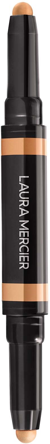 En dobbelt-sidet makeup-stift mærket Laura Mercier, med den ene side til highlighter og den anden til dækning.