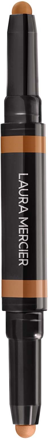 En dobbeltspids makeupstift med Lys og Mørk brun, mærket 'Laura Mercier' til contour eller highlighter.