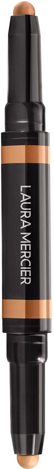 Et dobbeltend makeupprodukt med mærket 'LAURA MERCIER', sandsynligvis en concealer eller highlighter.