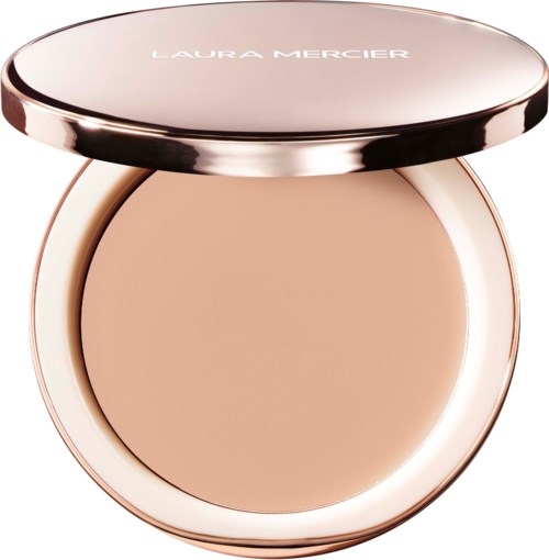 Ein kompakter Make-up-Puder mit roségoldenem Gehäuse und Laura Mercier auf dem Deckel.