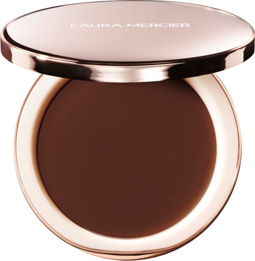 Ein runder Kompakt mit einem metallisch rosa Deckel, der dunklen braunen Puder enthält. Laura Mercier steht oben.