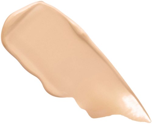 A beige liquid product is spread out on a white background, smooth and creamy in texture.