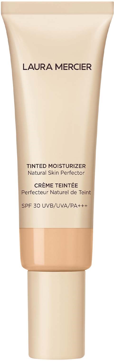 En beige tube med Laura Mercier farvet fugtighedscreme med SPF 30 og UV-beskyttelse.