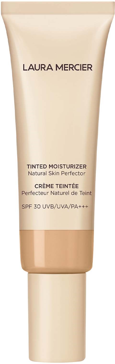 A beige tube of Laura Mercier tinted moisturizer with SPF 30, labeled as natural and perfecting skin.