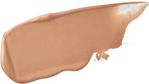 En glob av beige makeup eller foundation, med ojämna kanter och lite utanför huvudstrålen.