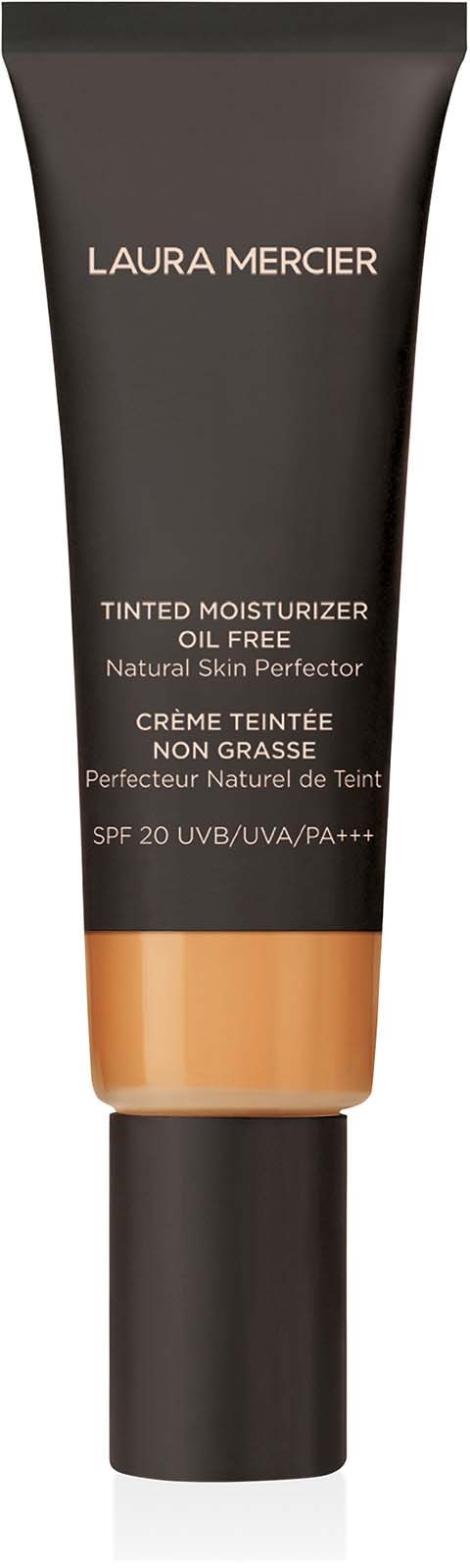 Ett svart och beige tub med märkesnamnet 'Laura Mercier' och text om tonad fuktighetskräm och solskydd.