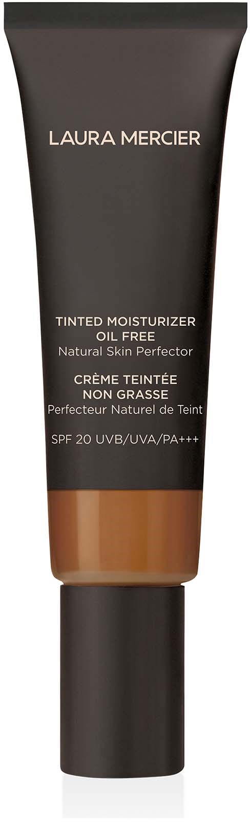Eine Tube Laura Mercier getönte Feuchtigkeitscreme mit SPF und schwarzem Deckel. Die Verpackung ist überwiegend schwarz mit braunem Teil.
