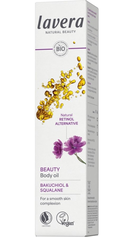 En vit förpackning av Lavera skönhets kroppsolja med lila blommor, visar ingredienser som retinol, Bakuchiol och Squalane, samt veganska och ekologiska märkningar.