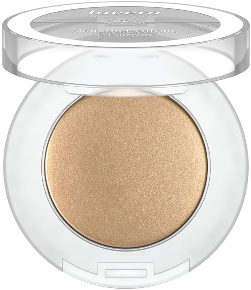En lille rund makeup-beholder med klar låg, der viser en beige, glitrende øjenskygge indeni.