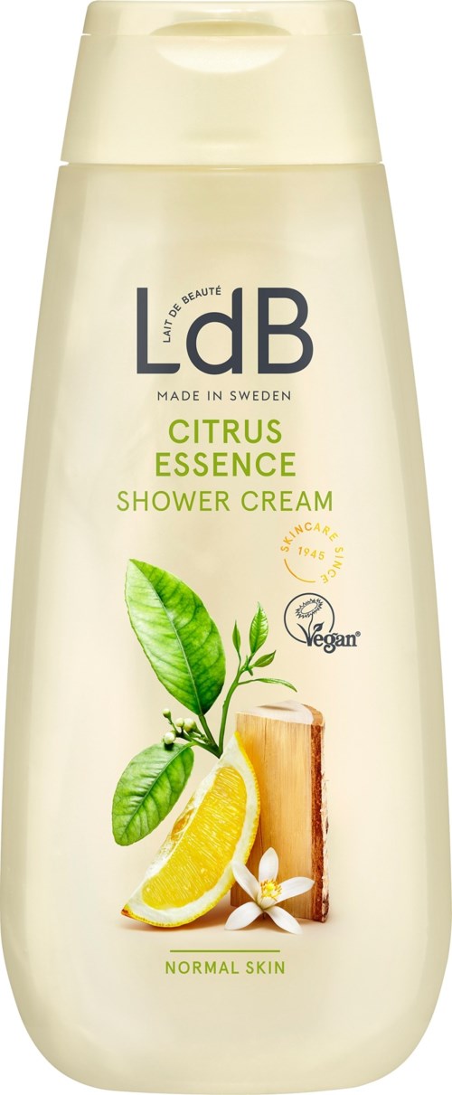 Valkoinen pullo LdB Citrus Essence suihkotuotteelle, jossa sitrustähtiä, vihreitä lehtiä ja vaniljaa.