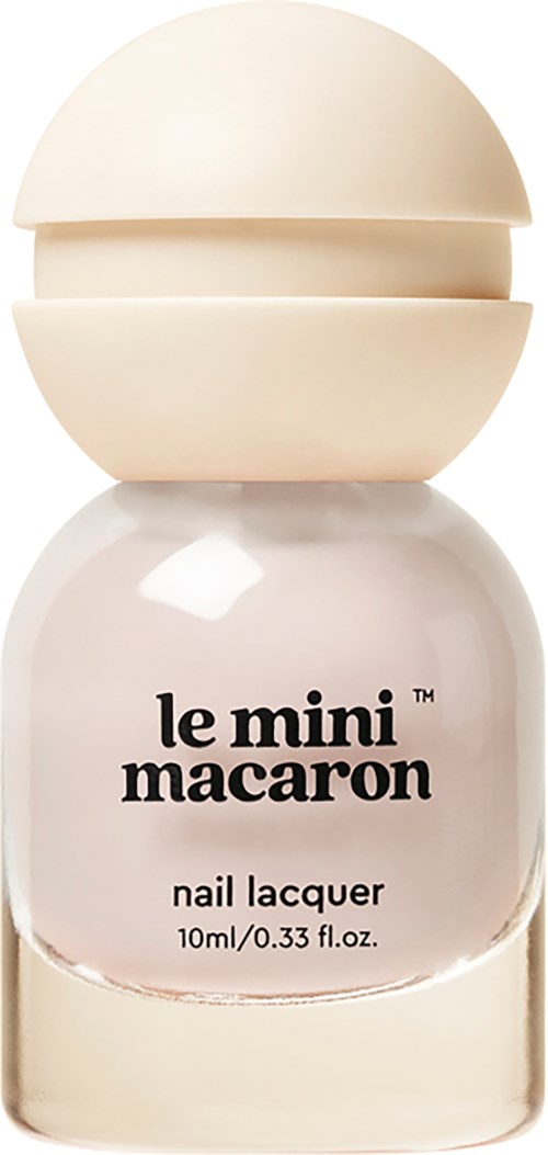En liten vit flaska nagellack märkt 'le mini macaron' med ett runt lock.