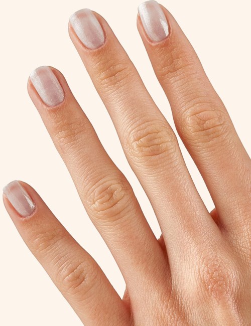 A hand with neatly trimmed nails and no rings or jewelry visible.