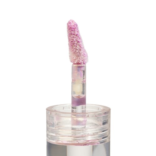 En rosa fluffig applikator kopplad till ett klart rör, med en genomskinlig behållare nedanför, används för skönhet eller hudvård.