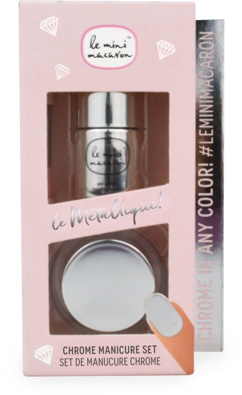 A pastel pink box contains a chrome manicure set with a nail polish bottle and a small container, labeled 'le mini macaron'.