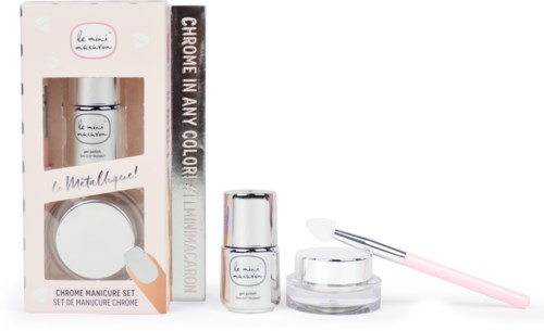 A nail care set in pink and silver with nail polish, tools, and a box label indicating chrome manicure.