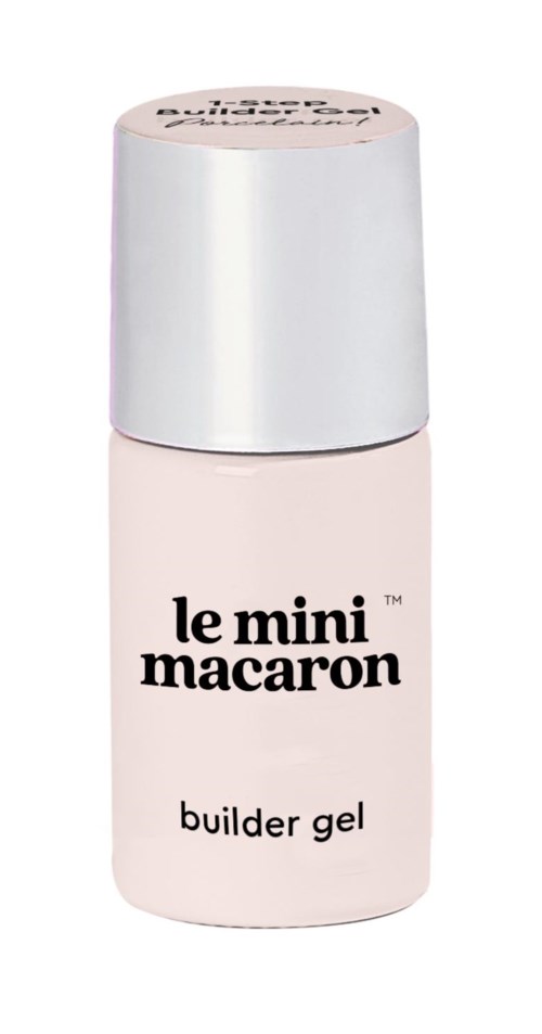 En liten, lys rosa flaske med teksten 'le mini macaron builder gel' og sølvkork.