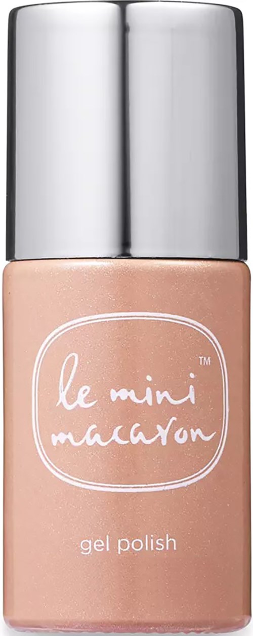 A small bottle of beige gel nail polish with a shiny silver cap, labeled "le mini macaron."