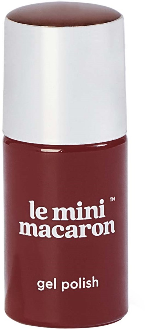 Lille flaske med rød gele neglelak mærket 'le mini macaron' med hvid låg.