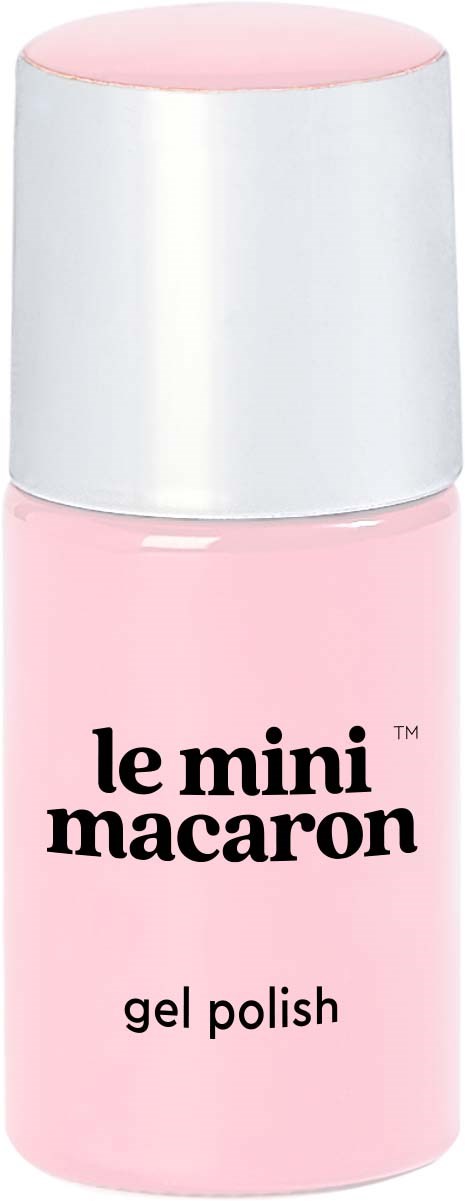 En liten rosa flaska med gel lack med vit kork, märkt 'le mini macaron' och 'gel polish.'