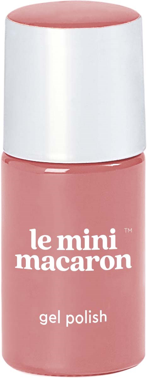 Pink nail polish in a small bottle with a white cap. It says 'le mini macaron gel polish' on the front.