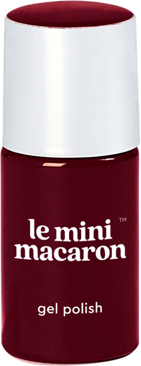 En liten flaska med mörkröd gelnagellack med märkningen 'le mini macaron' och vit kork.